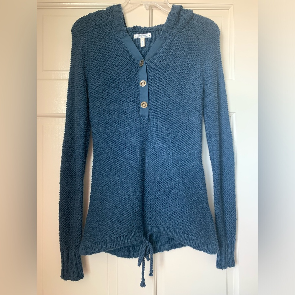 Navy blue hooded sweater.